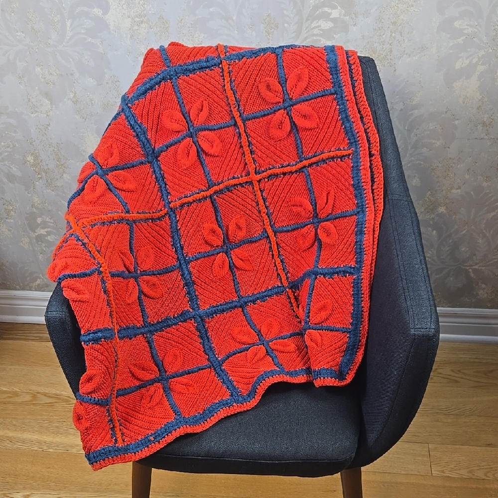 Red and Blue Knitted Blanket